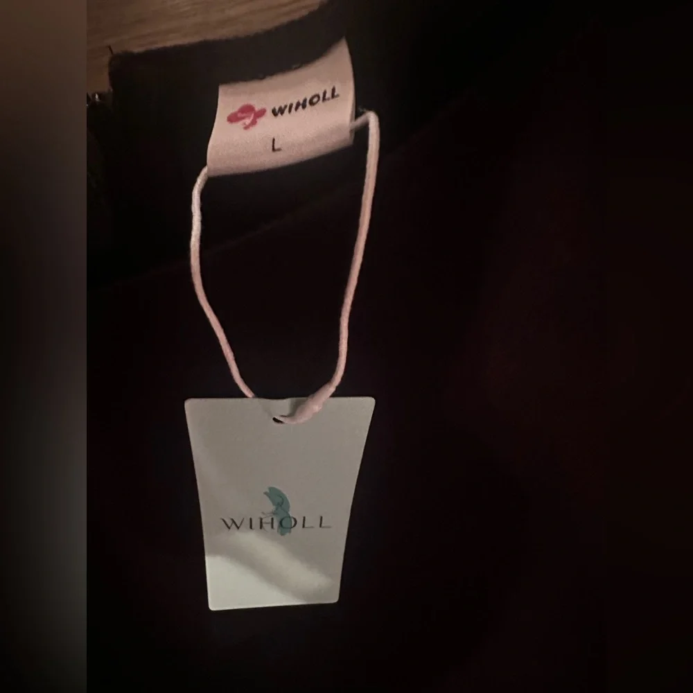 Sleek Black Sleeveless Mini Dress by - Picture 2 of 3